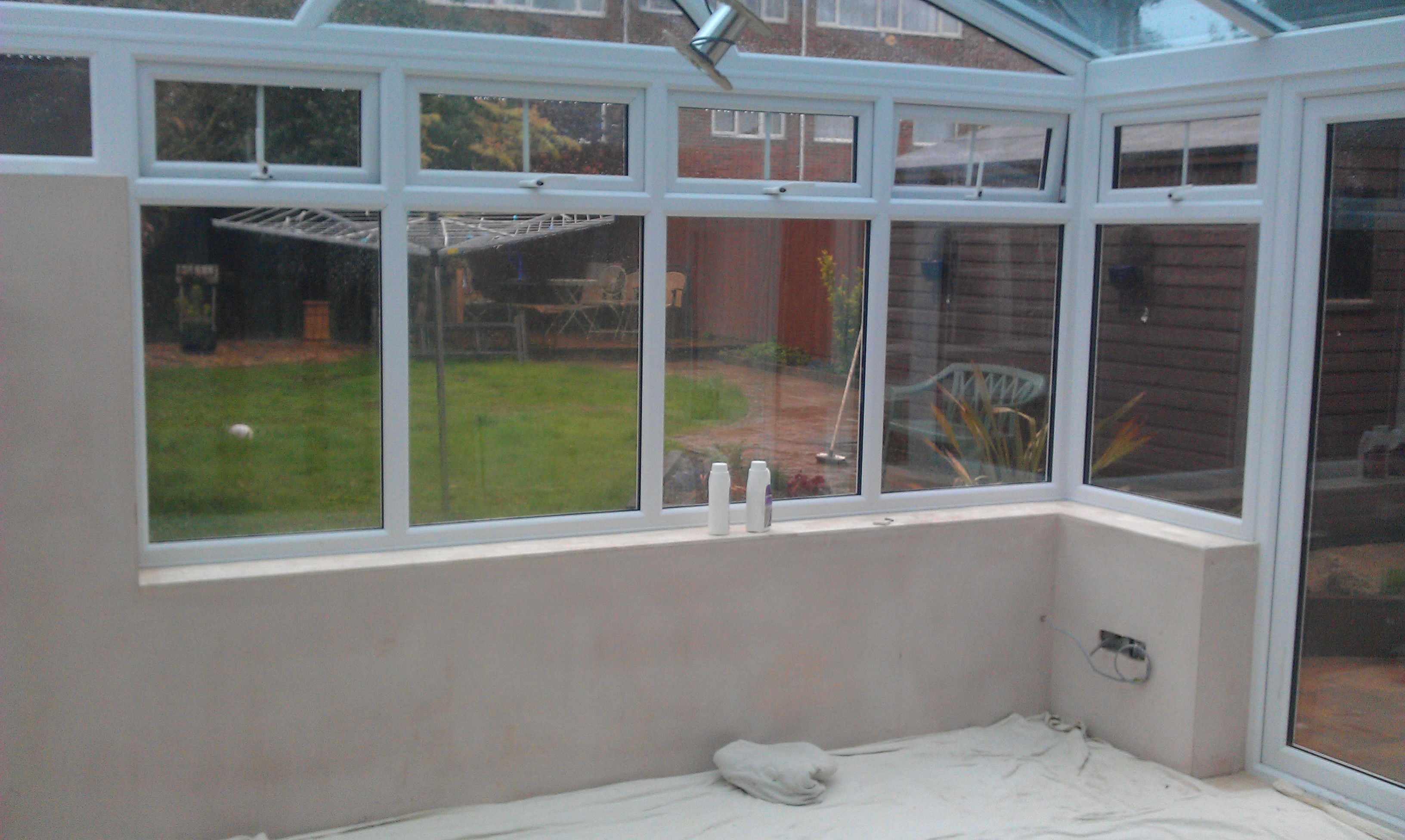bare plastered walls in new conservatory