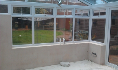 bare plastered walls in new conservatory