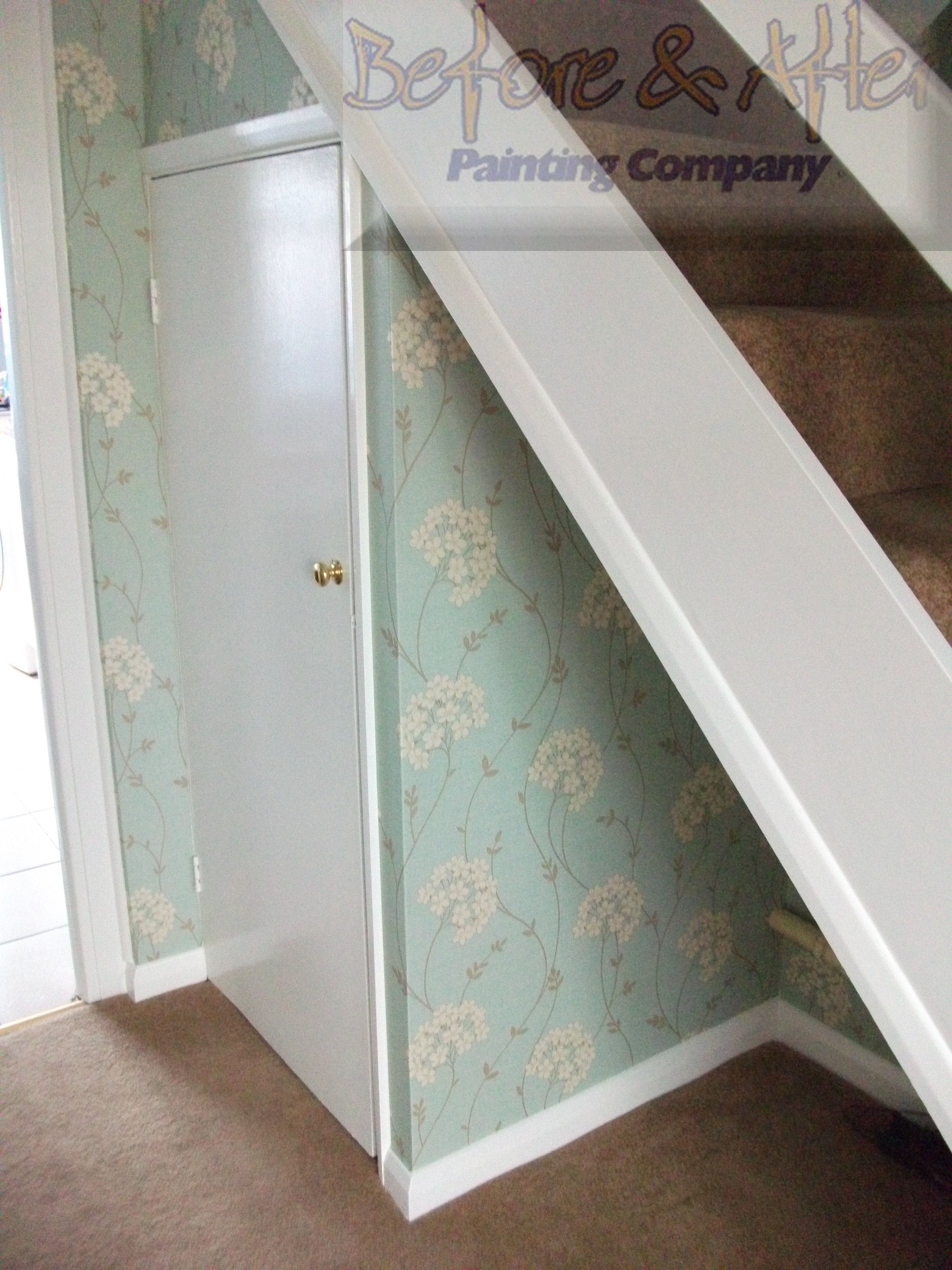 Duck Egg Blue wallpaper from Arthouse in a hall, stairs, landing in a Kent home.